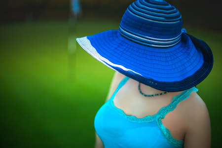 Beautiful young woman with sun hat enjoying her summer holiday in Punta Cana resort, Dominican Republic.の写真素材