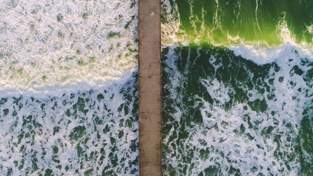 Aerial view of sea waves.,bridge,green,の写真素材