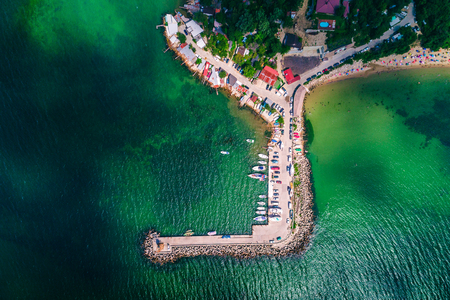 Aerial drone view of Black sea coast. Beautiful beach and fishing village. Euxinograd, Varna, Bulgaria.の写真素材