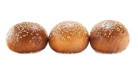 Homemade sourdough bread. Burger bun isolated on white background.の写真素材