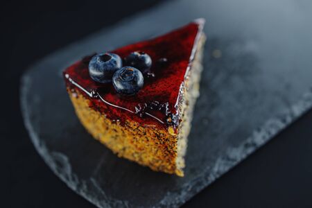 Cake with berry fruits, chia cereals and nuts isolatedの写真素材