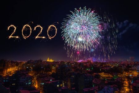 Downtown Varna cityscape with many flashing fireworks celebrating New Year's Eve.の写真素材