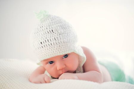 Newborn adorable one week baby boy sleeping.