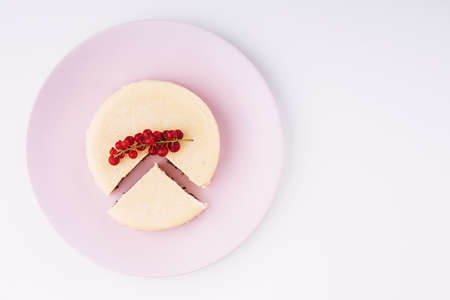 Homemade tasty cheesecake with chocolate in a plate isolatedの写真素材