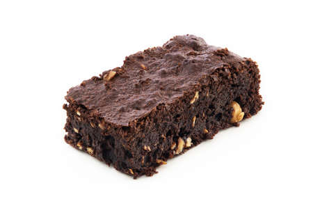 Brownie pieces on white background. Delicious chocolate pie.の写真素材
