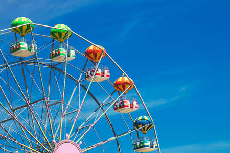 Ferris Wheel with Blue Sky and cloudsの写真素材