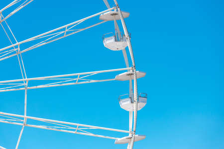 Ferris Wheel with Blue Sky and cloudsの写真素材