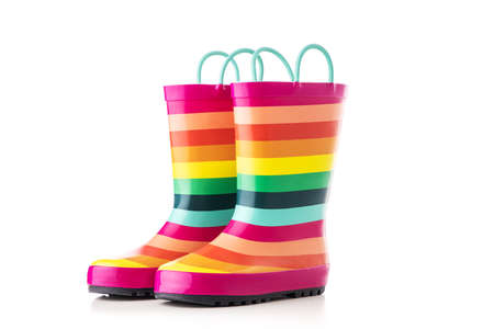 Rubber kid rain boots colorful print. Foot wear for children isolated on white backgroundの写真素材