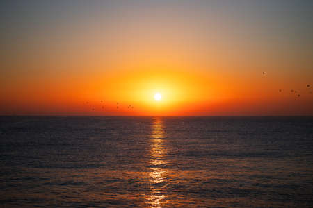 Beautiful sunrise over the seaの写真素材