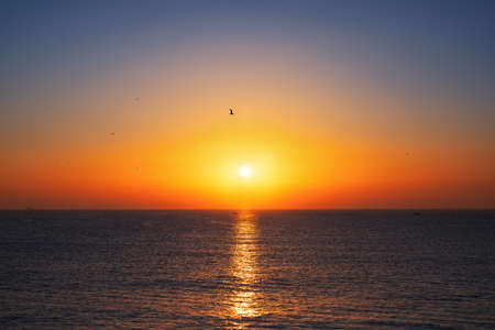 Beautiful sunrise over the seaの写真素材