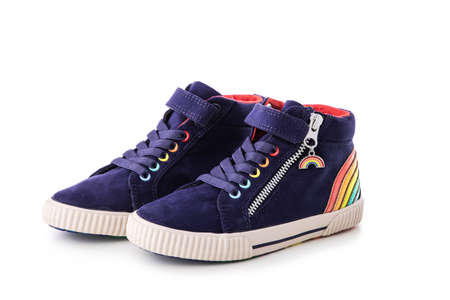 Rainbow colors kids shoes. Sport sneakers isolated on white backgroundの写真素材