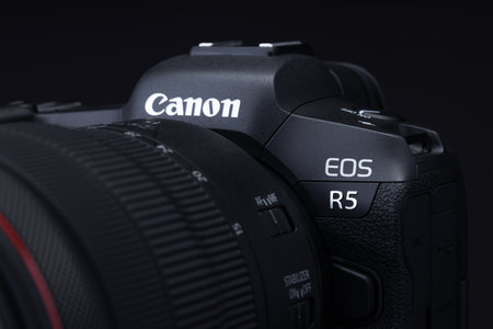 Varna, Bulgaria - November 07,2020: Image of Canon EOS R5 Mirrorless Digital Camera with 8k raw video on a black background. Canon is the world largest SLR camera manufacturer.のeditorial素材