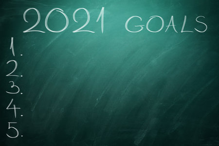 2021 Goals on green board. Chalkboard.の写真素材