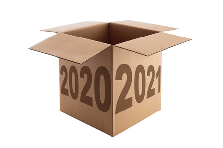 Happy New Year 2021 concept, lettering on the Open Cardboard box isolated on a white backgroundの写真素材