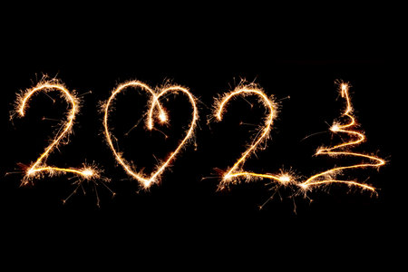 2021 written with Sparkle firework on black background, happy new year 2021 concept.の写真素材