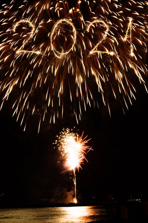 2021 made with sparklers on black backgroundの写真素材