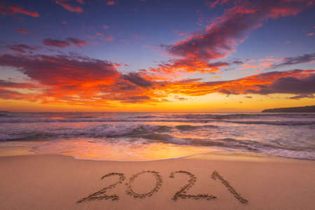 Happy New Year 2021 concept, lettering on the beach.の写真素材
