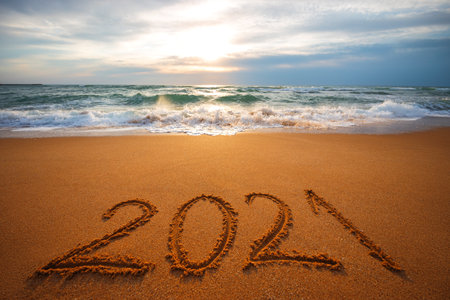 Happy New Year 2021 concept, lettering on the beach.の写真素材