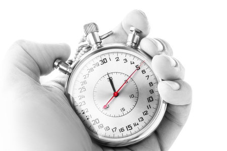 Stopwatch timekeeper and hand of a manの写真素材