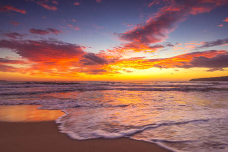 Beautiful cloudscape over the sea, sunrise shotの写真素材
