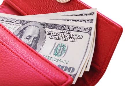 Red wallet with usd bills isolated on whiteの写真素材