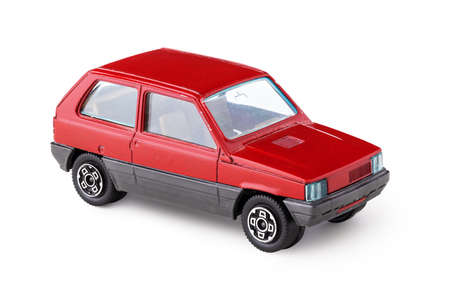 Retro car, miniature collectible vintage toy, isolated on white background with clipping pathの写真素材