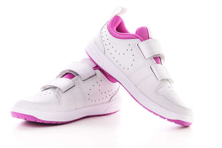 Casual girls shoes isolated on white background. Sport leather sneakers.の写真素材
