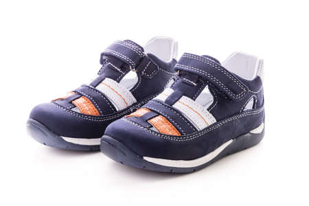 Summer shoes isolated on white background. Boys leather sandals.の写真素材