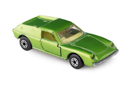 Retro car, miniature collectible vintage toy, isolated on white background with clipping pathの写真素材