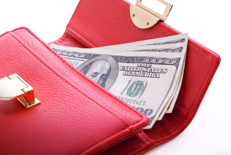 Red wallet with usd bills isolated on whiteの写真素材