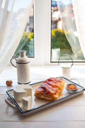 Baked cheese pie with milk. Bulgarian butter banitsa for breakfastの写真素材