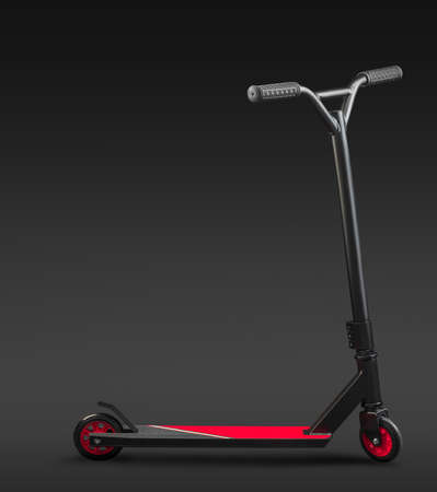 Red modern scooter studio isolated on black background with clipping pathの写真素材