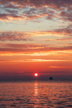 Beautiful cloudscape over the sea, sunrise shotの写真素材
