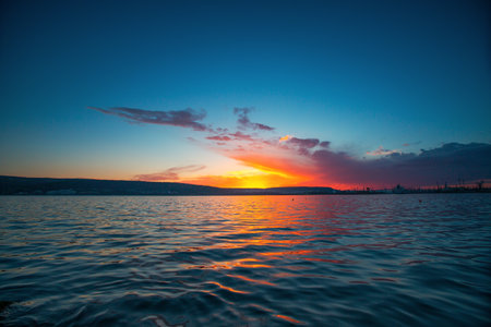 Beautiful cloudscape over the sea, sunset shotの写真素材