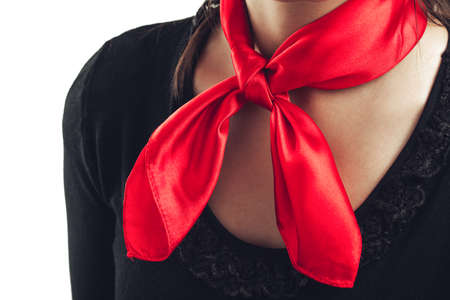 Women's shirt with red scarf isolated on whiteの写真素材
