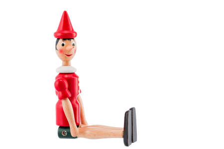Pinocchio Toy Statue isolated on white backgroundの写真素材