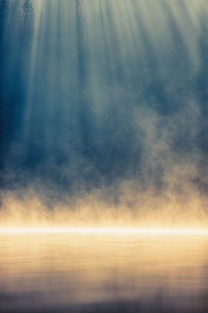 Morning fog on the lake, sunrise shotの写真素材