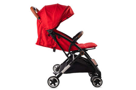 Baby pram, modern red stroller isolated on whiteの写真素材