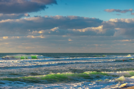 Beautiful green sunrise waveの写真素材
