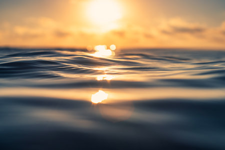 Sea wave close up, low angle view, sunrsie shot.の写真素材