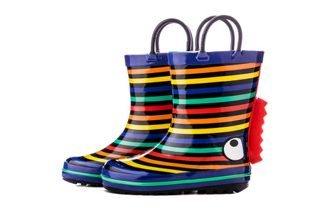 Colorful kids rubber boots for rain isolated on white background.の写真素材