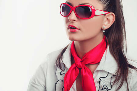 Girl office staff with a red scarf and glasses isolated stock photoの写真素材