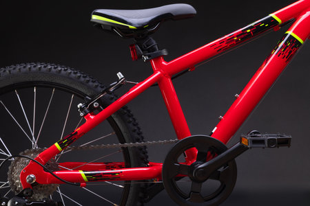 Sport mountain red bicycle isolated on black backgroundの写真素材