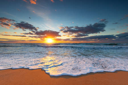 Beautiful cloudscape over the sea, sunrise shotの写真素材