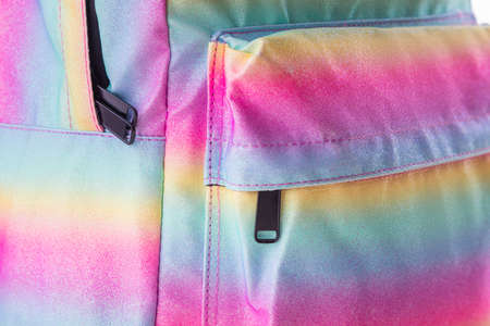 Rainbow school backpack isolated on whiteの写真素材