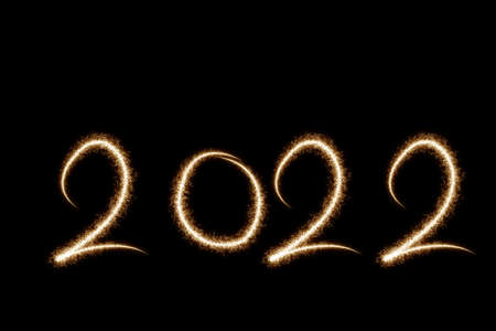 2022 written with Sparkle firework on black background, happy new year 2022 concept.の写真素材