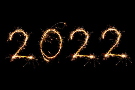 2022 written with Sparkle firework on black background, happy new year 2022 concept.の写真素材