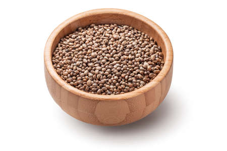 Cannabis Hemp seeds in wooden bowl isolated on white backgroundの写真素材