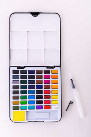 Set of watercolor paints, brushes for painting. Multicolors