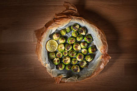 Cooked Organic Brussel Sprouts On a wooden tableの写真素材